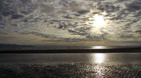 Intense Evening Bright Sunset Clouds over Sandbar Stock Footage 12031418