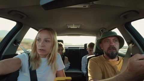 Intense family dynamics unfolding during road trip, capturing emotional ten.. Stock Footage 315519803