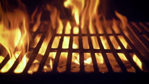 Intense fire from burning coal over a barbecue grill. Stock-Footage 135603814