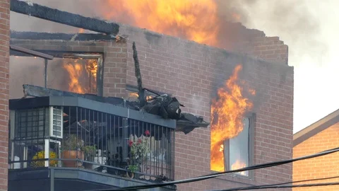 Intense Fire Fully Engulfing Apartment Unit - 24fps 1080p Stock Footage 91903697