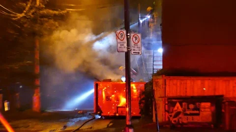Intense fire in garbage container Stock Footage 116712197