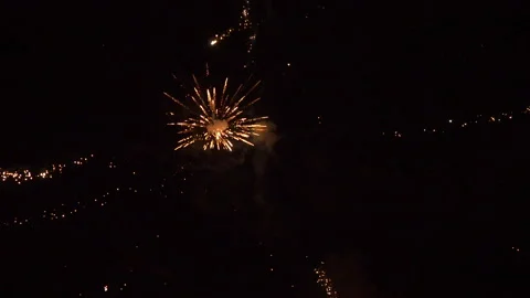 Intense fireworks in the night sky, explosions and sparks. Stock Footage 155133313