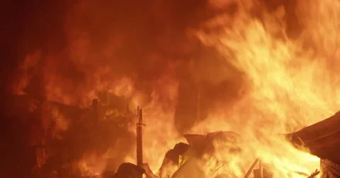 Intense flames in fire inferno in poor settlement Stock Footage 65773003