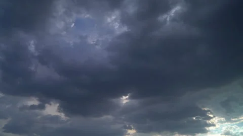 Intense, foreboding storm clouds gather menacingly overhead. Stock Footage 253972075