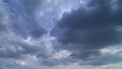 Intense, foreboding storm clouds gather menacingly overhead. 스톡 동영상 253983900