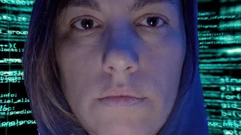  Intense Gaze: A Female Hacker Deciphers the Code Veil Stock Footage 270572547