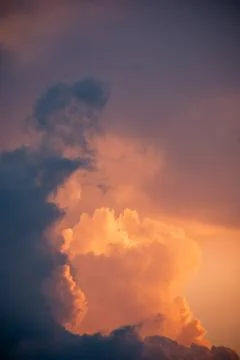 Intense glowing clouds at sunset with negative space for copy. Stock Photos