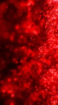 Intense glowing red particles exploding outward in a vibrant energetic abstra 스톡 일러스트