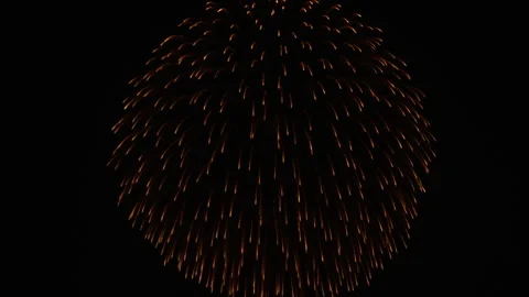 Intense golden firework explosion with blue core detail. Video stock 335207087