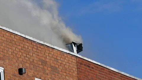 Intense grey smoke coming out of chimney Stock Footage 101995699