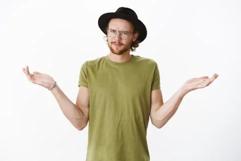 Intense guy cannot get clue what went wrong being left without answers standing Stock Photos