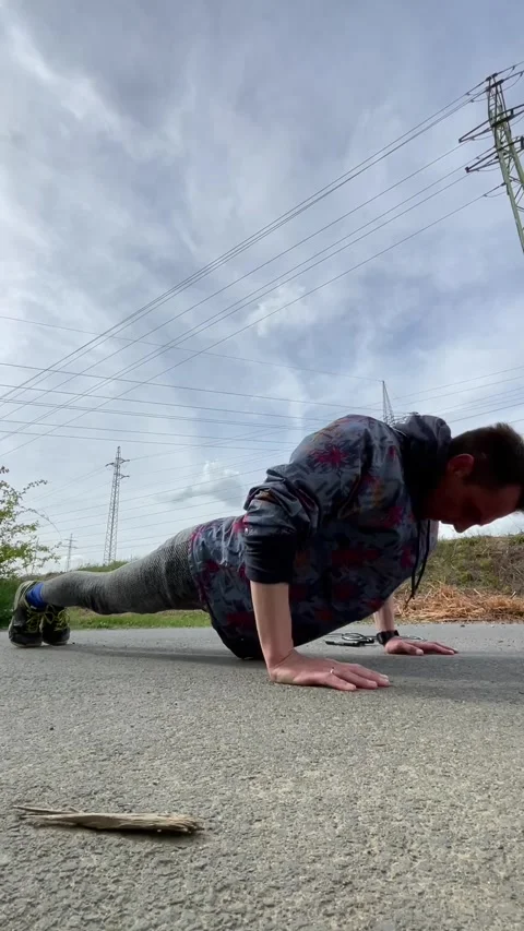 Intense gym activity. Energetic exercise with ropes and pushups outside Stock Footage 335359659