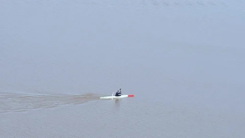 Intense hand rowing men in a water canoe Stock Footage 111950176
