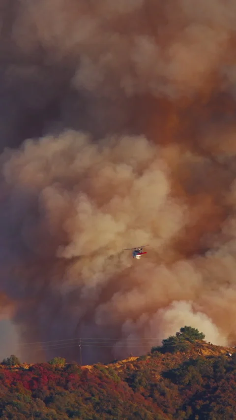 Intense Helicopter Action Taking Place Amidst Fire in Los Angeles Area Stock Footage 299676458