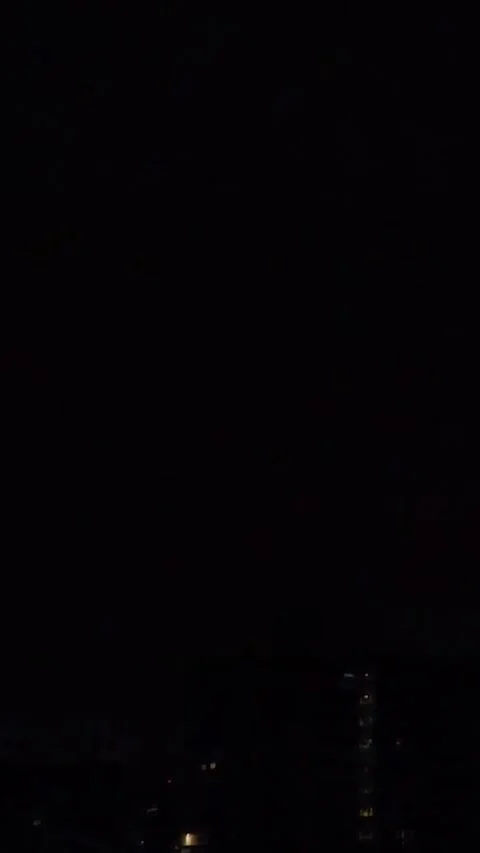 Intense lightning strikes during a storm at night in the city Vídeo Stock 297222844