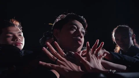 Intense Portrait of Young Men in Dramatic Lighting Stock Footage 296683103