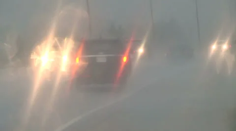 Intense rain on highway slows traffic Stock Footage 37067017