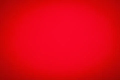 Intense red background with subtle vignette for creative designs Stock Photos