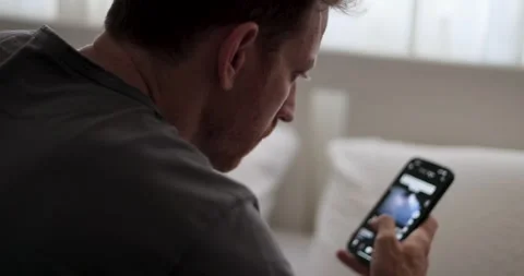 Intense Scrolling on Social Media. guy scrolling fast through social media  Stock Footage 277969554
