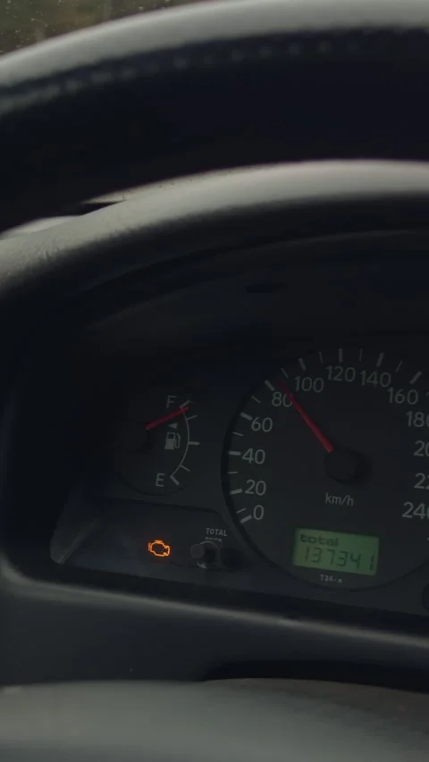 Intense slow motion highlighting tachometer movement and moist road glow. Energy Stock Footage 333260346