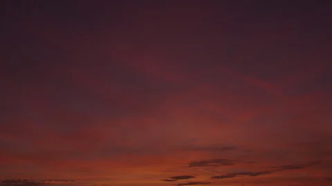 Intense Sunset Illuminates Sky in Red Stock Footage 259224900