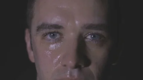 Intense sweaty face of young muscular man pulling rope Stock Footage 73109657