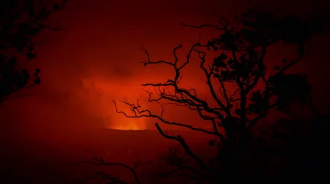 Intense time lapse tracking reveal shot Kilauea crater through brush silhouette 動画素材 50526586