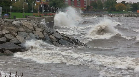 Intense waves rolling in and breaking during storm with hurricane force winds Stock Footage 36665320