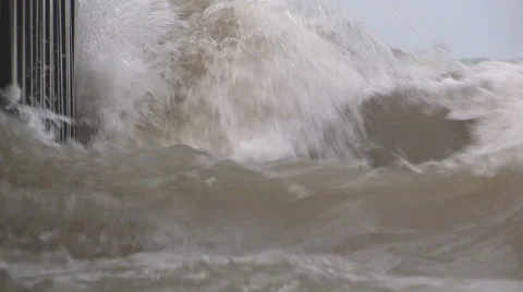 Intense waves rolling in and breaking during storm with hurricane force winds Stock Footage 40307999