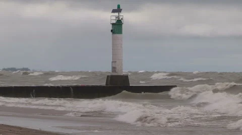 Intense waves rolling in and breaking during storm with hurricane force winds Stock Footage 41798142