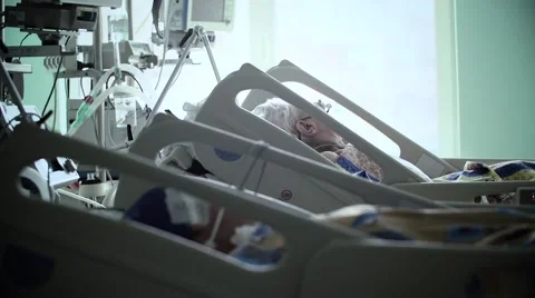 Intensive Care Unit with the patient Stock Footage 58265698