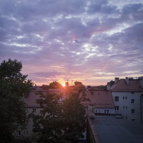 Intensive color sunset with many clouds over cityscape Stock Footage 168523310