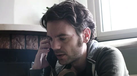 Intensive man talking phone Stock Footage 63253935