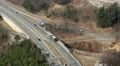 Intensive traffic on motorway, many cars, trucks moving on road HD Footage