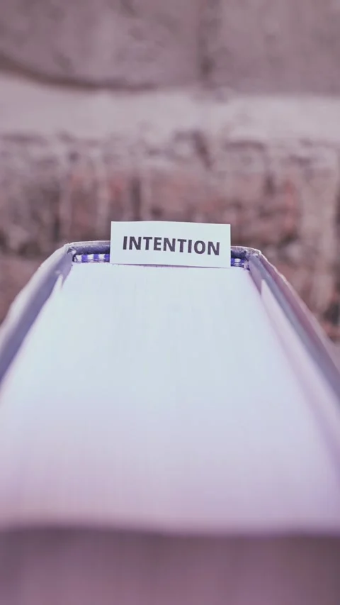 Intention Word on Small White Paper Card Goal Setting Concept Video stock 338238776