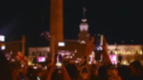 Intentional blurry copy space background. Spectators watch fireworks record.. 스톡 동영상 278650005