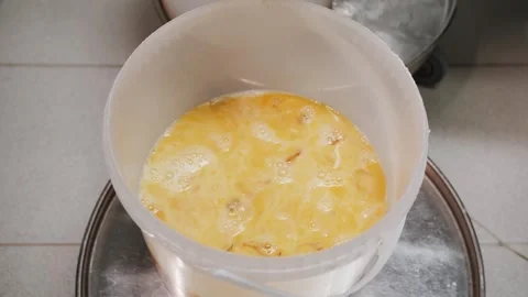 Intentional Eggshell Cracking For Extracting Egg Contents. Stock Footage 322010044