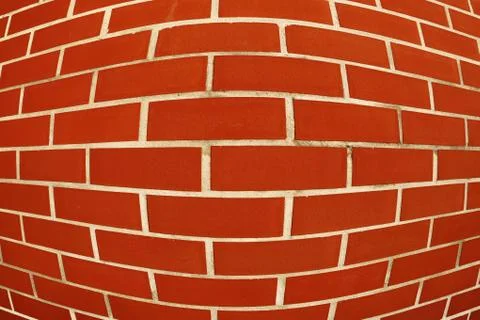 Intentionally distorted red wall as a catchy background/texture Stock-Fotos