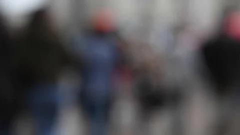 Intentionally motion blurred abstract image of commuters and people walking Stock Footage 106975448