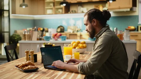 Interacting with AI image generator through chatbot interface on laptop Video stock 330442173