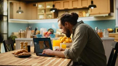 Interacting with AI image generator through chatbot interface on laptop 스톡 사진