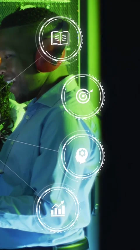 Interacting blue-shirted man with red headphones using tablet at office with AR Stock Footage 332823621