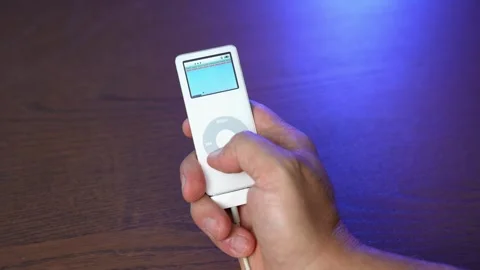 Interacting with Classic Apple iPod Nano in Games Mode Stock Footage 285886453