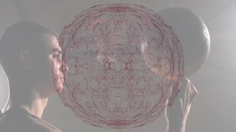 Interacting with complex animation, person studying red network pattern in Stock Footage 305686380