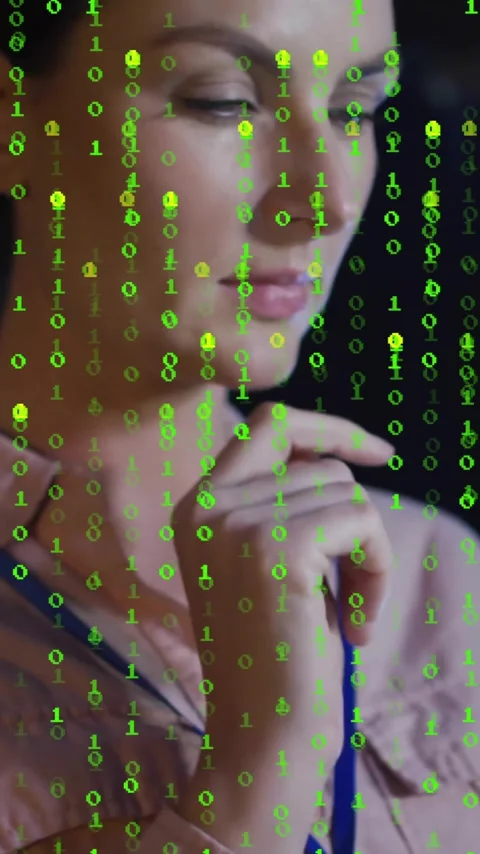 Interacting with digital interface, woman with green binary code animation 動画素材 344285221