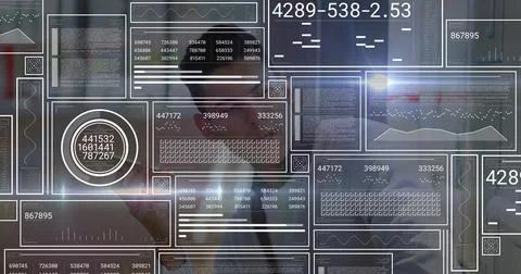 Interacting Hispanic man in suit adjusting floating digital panels at office, 写真素材