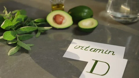 Interaction between Nutrient Rich Avocado and the Benefits of Vitamin D Concept Stock Footage 310170759