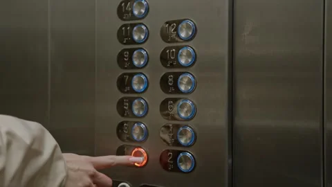 Interaction with glowing buttons on elevator control in cabin Stock Footage 333333633
