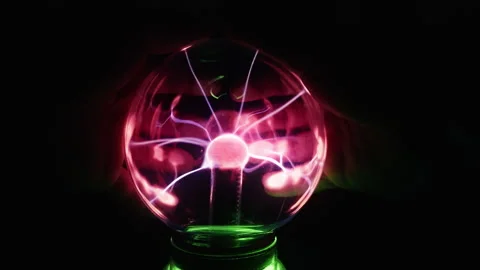 Interaction Of Human Hand With Glowing Plasma Sphere Forming Bright Lightni.. Stock Footage 337773354