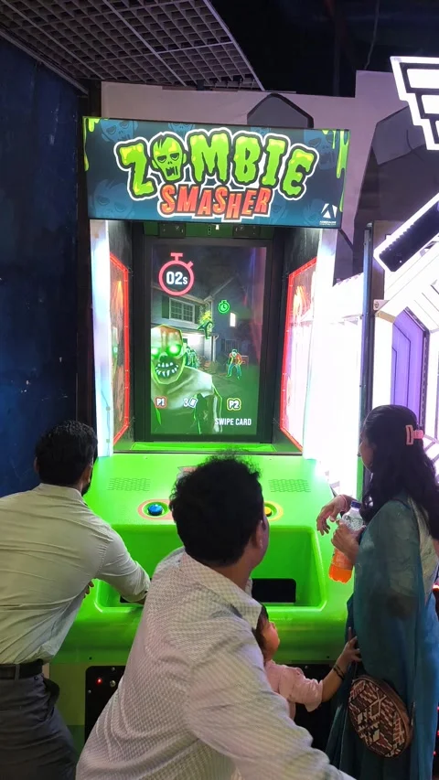 Interactive arcade shooting game machine with colorful targets and dual player Stock Footage 331461062